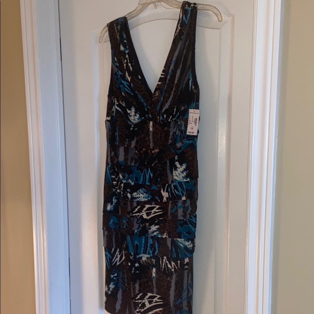 Stylish Blue and Brown Patterned Dress
Final sale